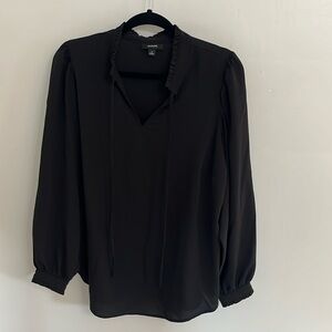 Romantic, keyhole, tie-front blouse with ruffle trim. 1X Black
